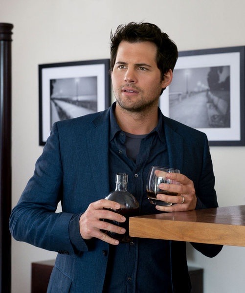 Kristoffer Polaha in a blue blazer during a feature film scene